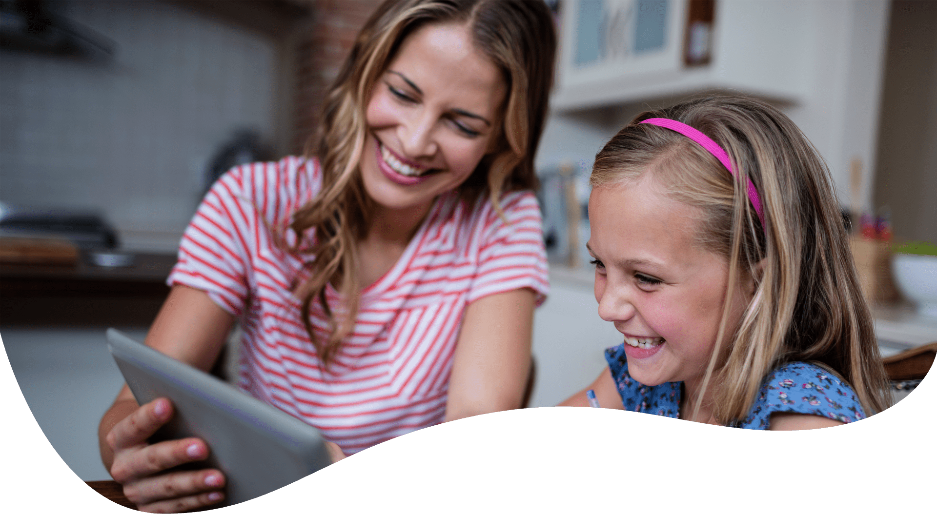 Mother and daughter watching Nicole's Saxon Math Videos on a tablet